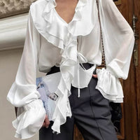 Blouse Monica à col noué et volants
